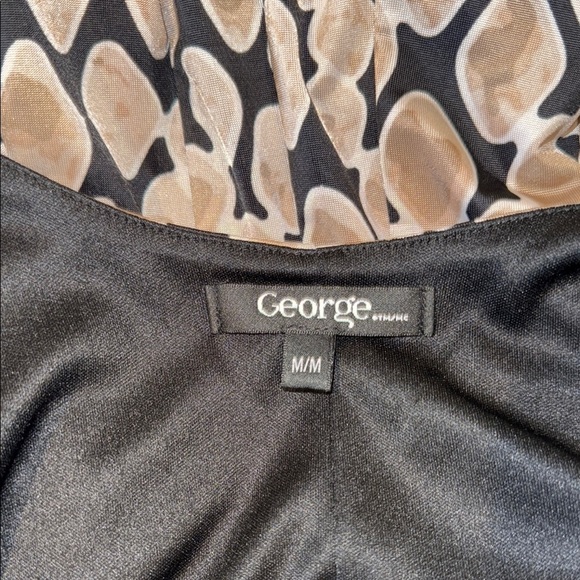 Elegant Black and Cream Patterned Dress - Picture 2 of 13